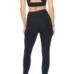 Nærmere billede af en model bagfra som har Röhnisch Flattering High Waist Tights, Black på