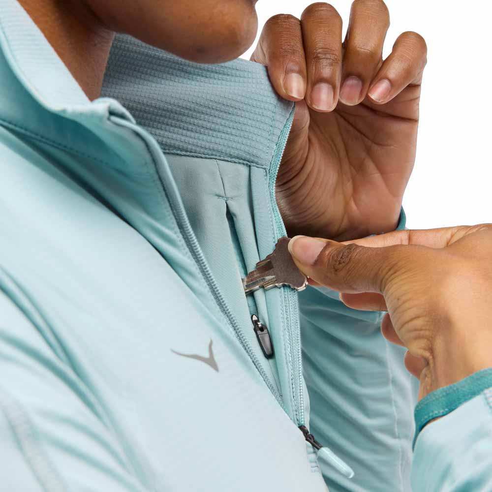 brystlomme på en Hoka Glidetech Quarter Zip træningstrøje (dame)