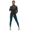 Hoka Glidetech Quarter Zip træningstrøje (dame) på en model