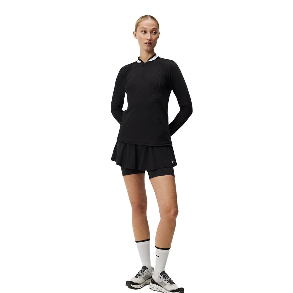 Forside af J.Lindeberg Leonor Mid Layer (dame) på en model