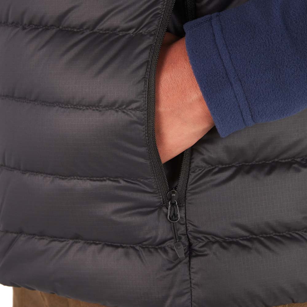 Varme lommer på Marmot Highlander Vest dunvest (dame)