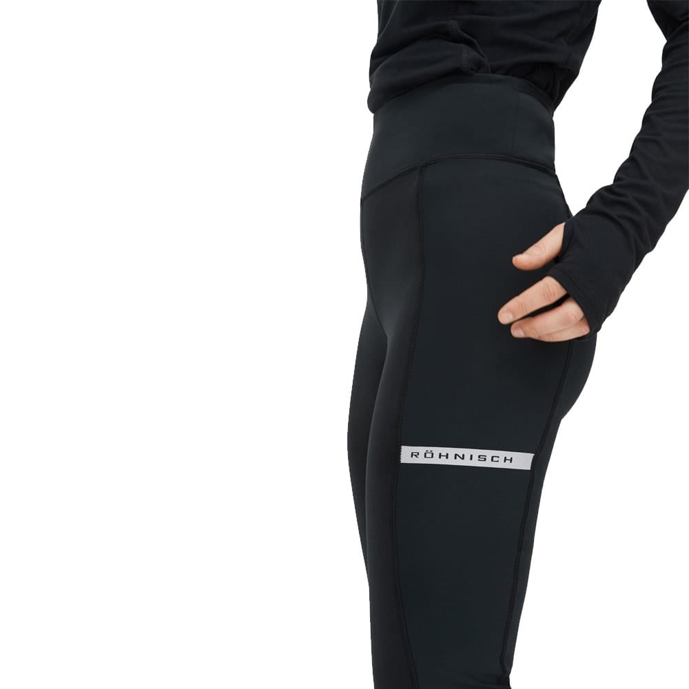 Röhnisch Insulate Wind Shield Tights løbetights (dame) set fra siden, så man kan se logoet