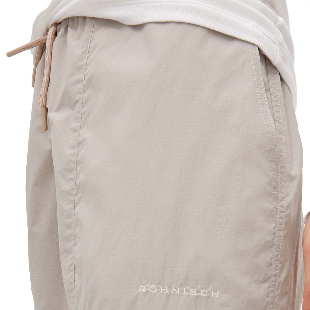 Elastik med snørebånd på et par behagelige og beskyttende Röhnisch Frankie Wind Pants vindbukser (dame)