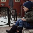 et barn har et par Kavat Rättvik TX vinterstøvler (børn) på