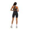 Röhnisch Flattering High Waist Bike Tights mallilla, joka on selkä kameraan päin