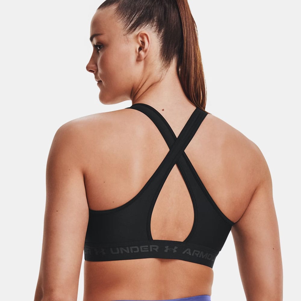 Under Armour Cross Back Mid Bra urheiluliivien takaosa (naiset) mallin yllä