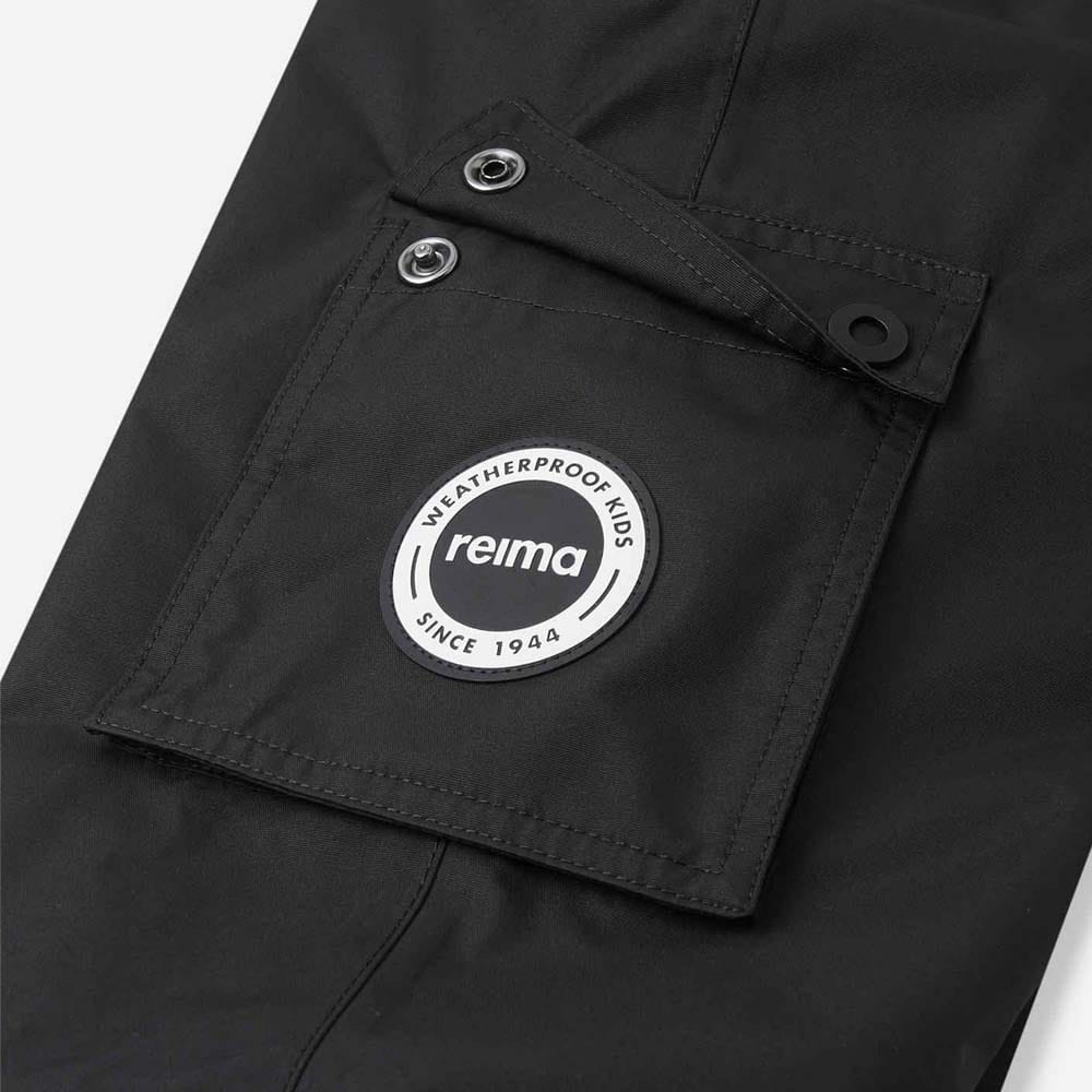 lomme på Reima Tiksi vanntette smeklebukser (barn)